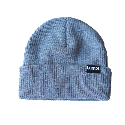 Blue ribbed HAVN WaveStopper™ Beanie with black logo patch, displayed flat against white background.