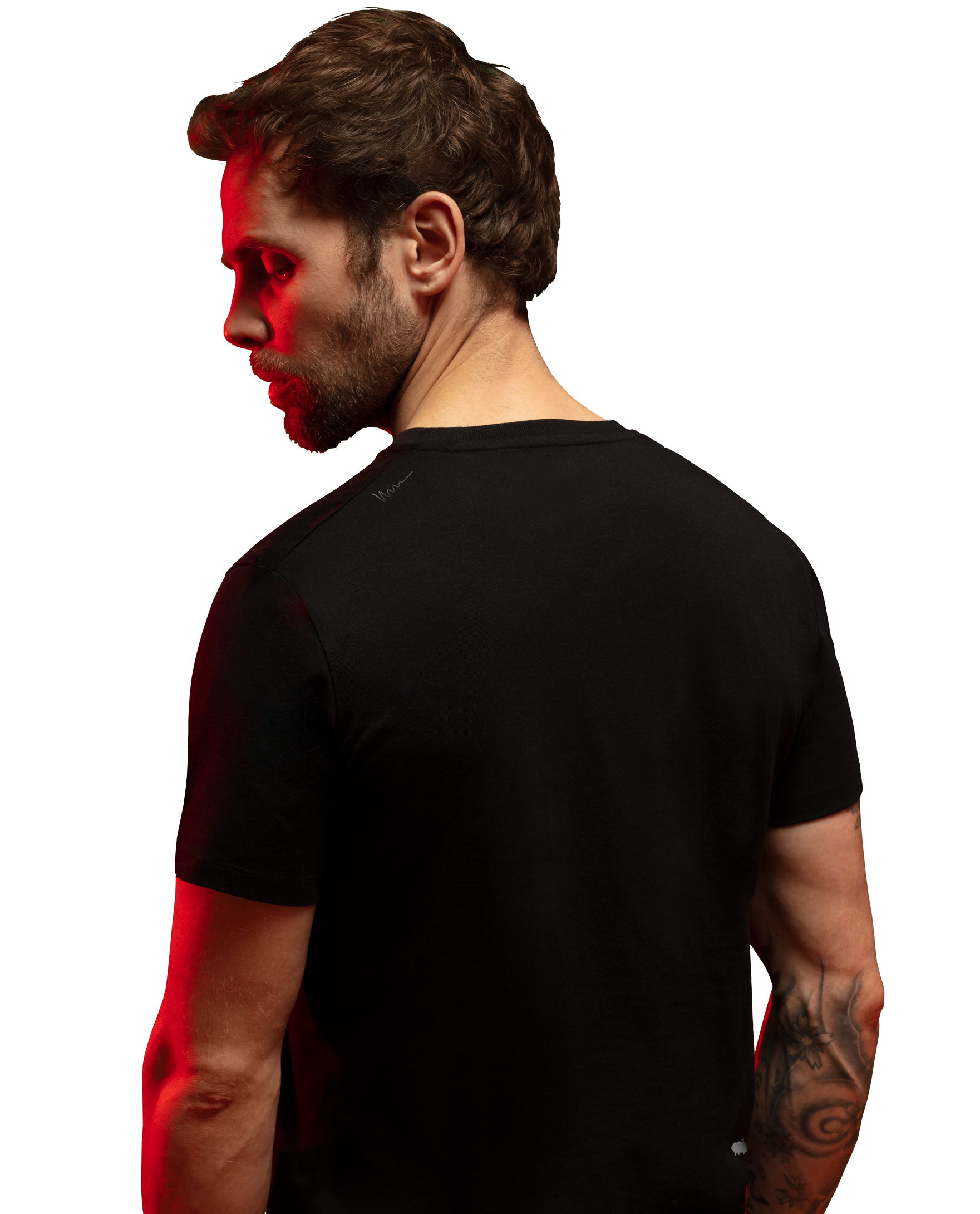 Man wearing black HAVN WaveStopper™ T-Shirt 2.0 shown from side profile with red light overlay effect.
