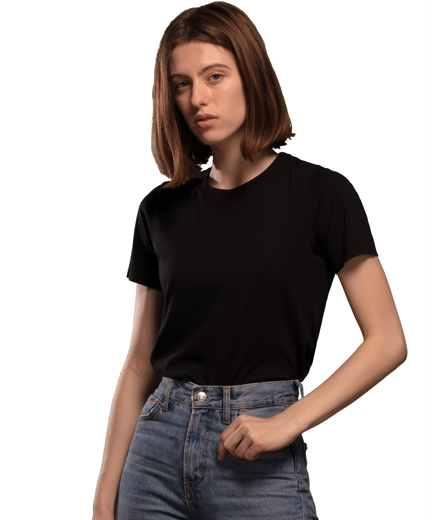 Woman wearing black HAVN WaveStopper™ T-Shirt 2.0 with blue jeans, front view against white background.