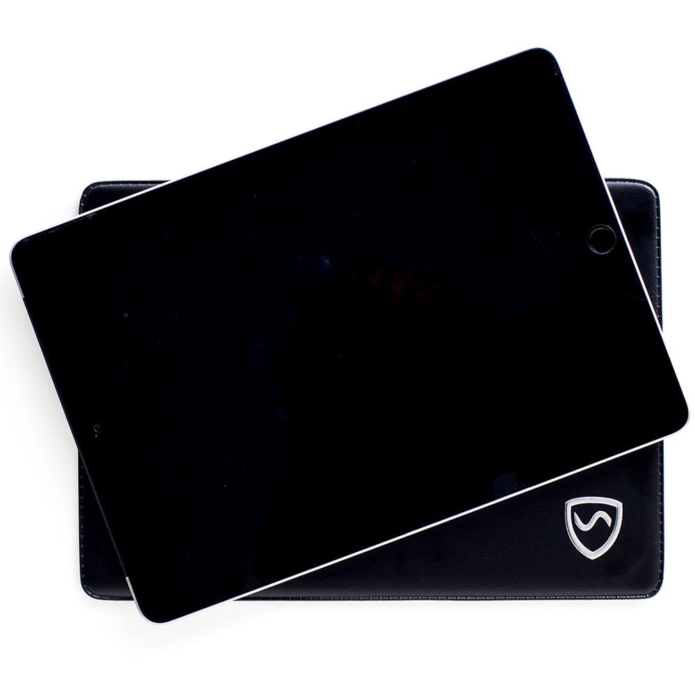 SYB Tablet Pad in black with shield logo, displayed under a tablet device at an angle.