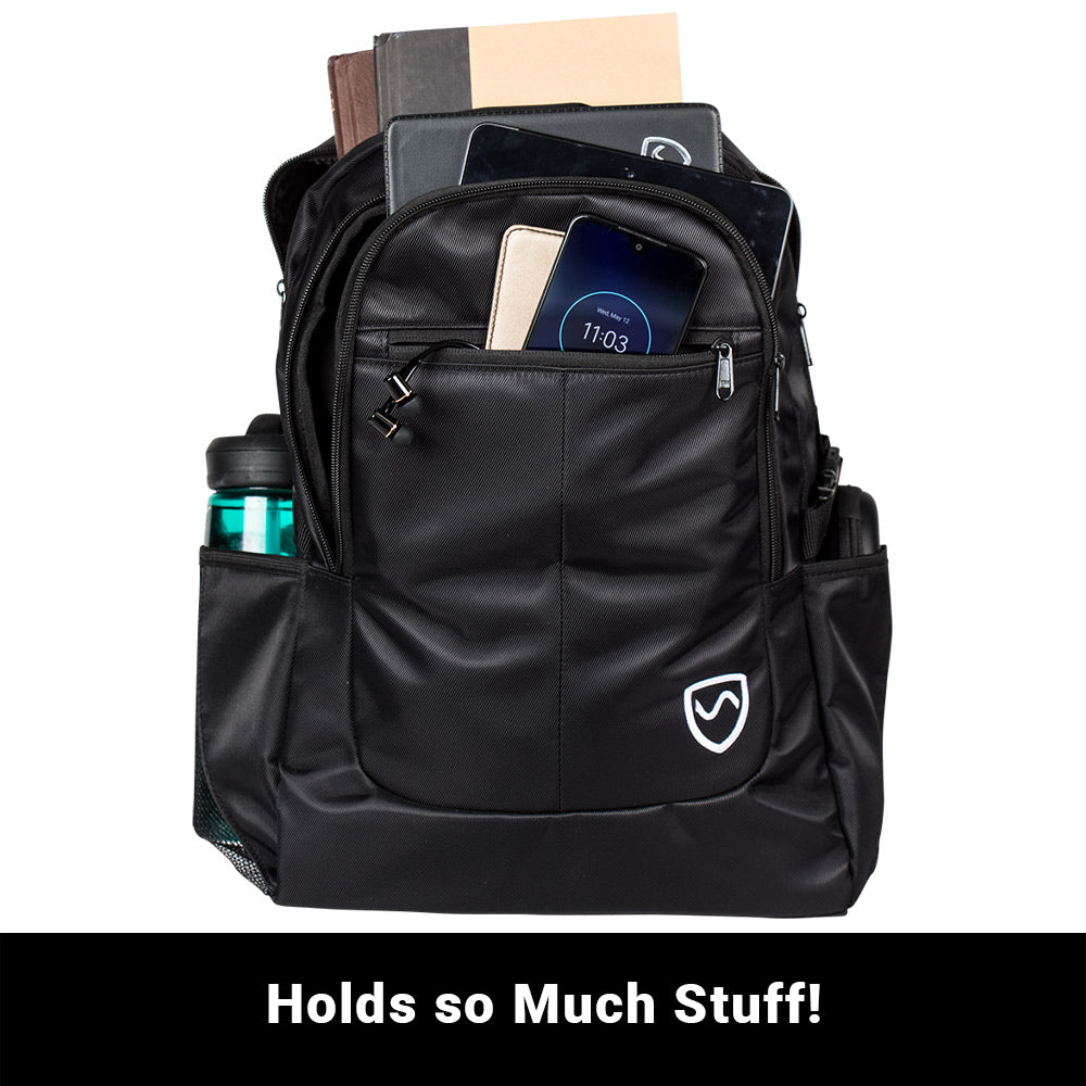Black SYB Backpack packed with smartphone, notebooks, water bottle, and documents, demonstrating storage capacity.