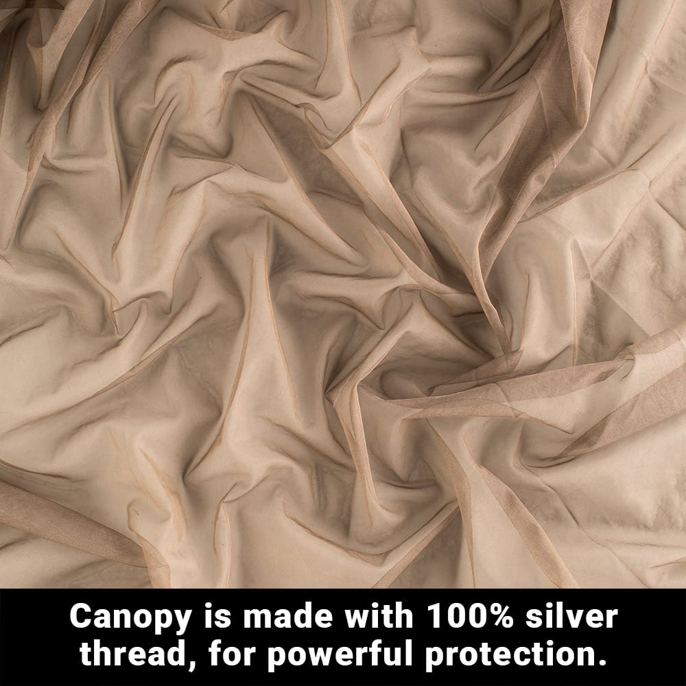 Beige SYB Faraday Bed Canopy fabric close-up showing woven silver thread texture and draping detail.
